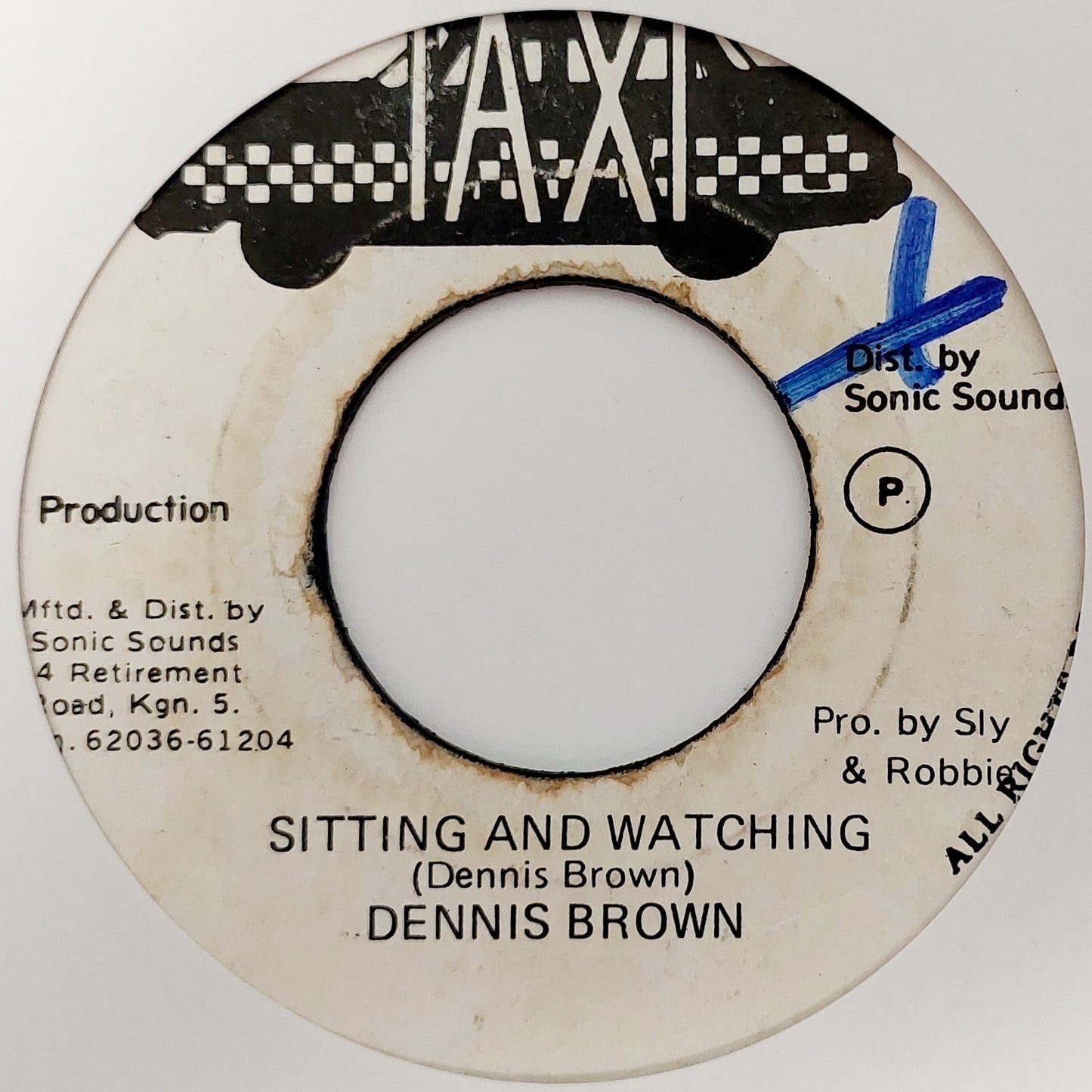 Dennis Brown - Sitting & Watching / Revolution